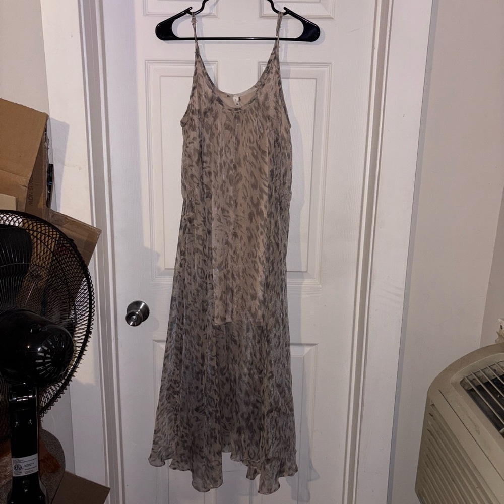 Tan and brown shimmer cheetah print midi dress with a flowy, boho vibe